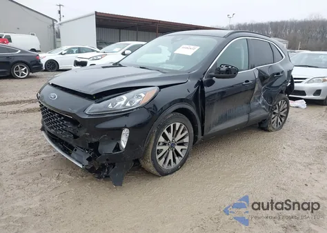 2021 Ford Escape Titanium Hybrid from USA, damaged, VIN 1FMCU9DZ0MUA82711